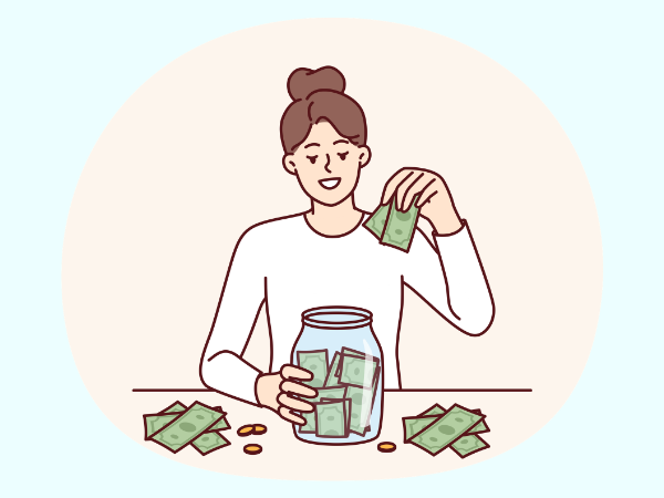 透明な大きい瓶にお金をためている女性